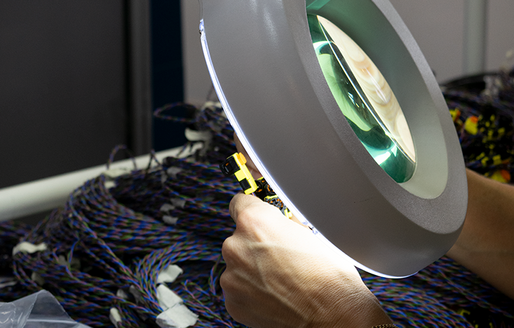 Quality control inspection of wiring harnesses at Sulimet